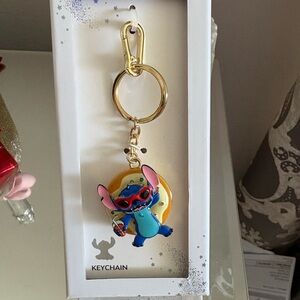 Spinning around Stitch Keychain with Gold Clip New in box